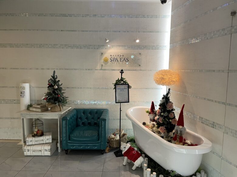 Decorated hallway leading to the front desk