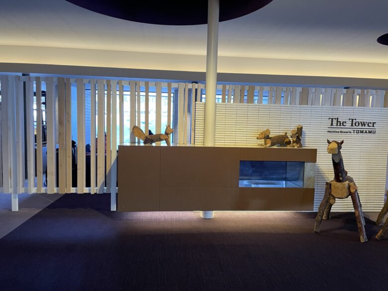 Hotel lobby entrance with wooden fox decorations