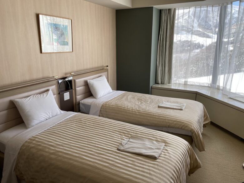 Twin beds by the window