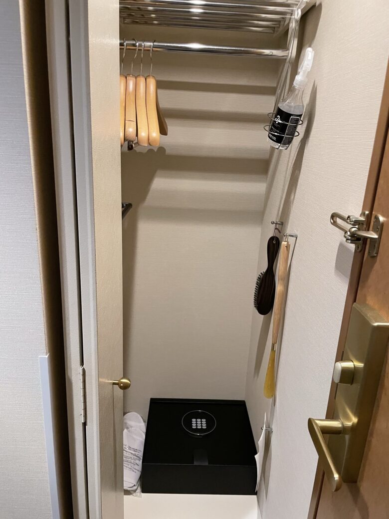 Closet with hangers and safe