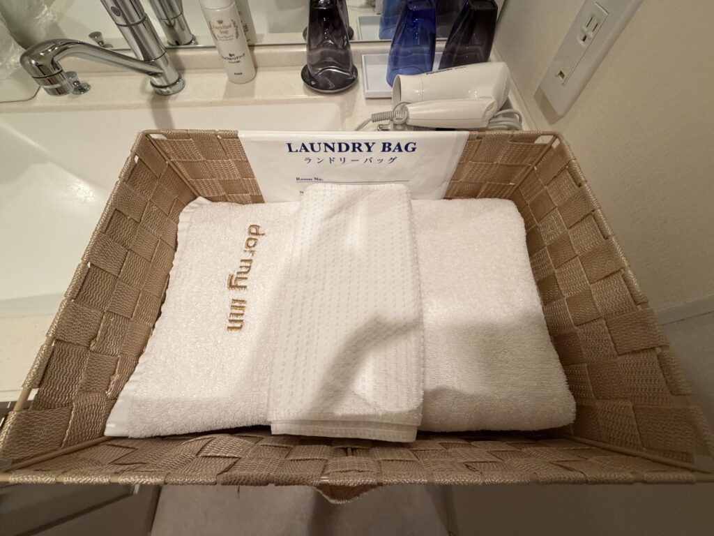ランドリーバッグに入ったタオル